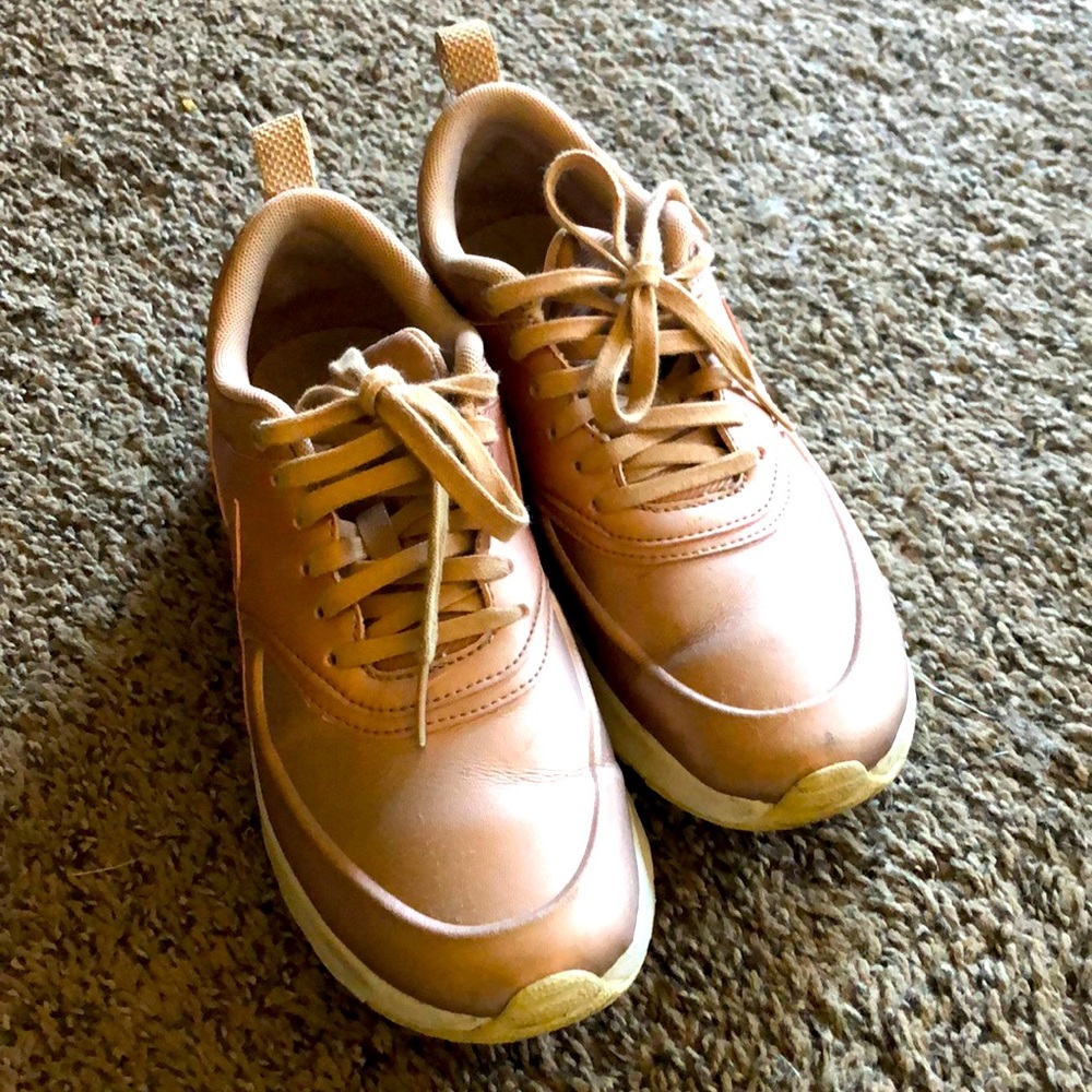 Rose gold Nike sneakers